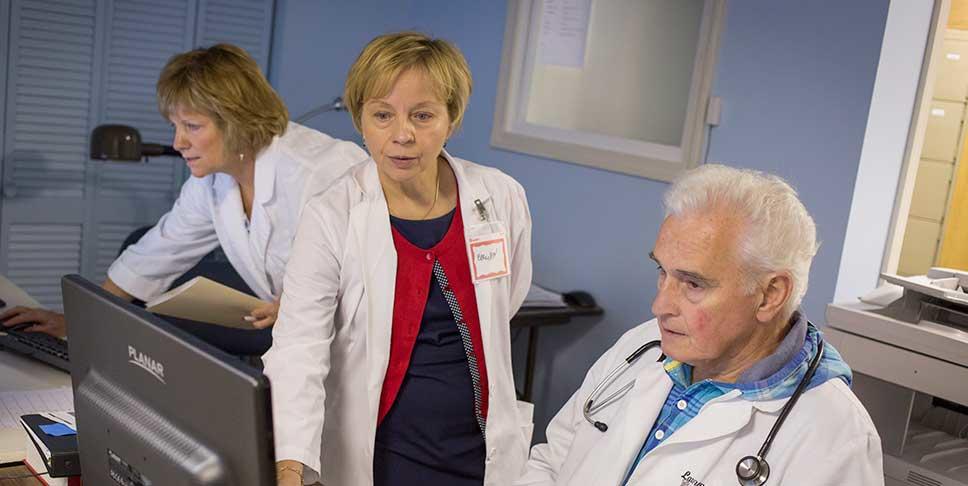 A $9,000 grant from the Community Foundation of Westmoreland County enabled Majesty Health Care Clinic, an all-volunteer organization that recently opened in Greensburg, to invest in new computers and a fluid database. Here, Dr. Larry Lyons and Ellie Yearsley, RN, discuss treatment options.